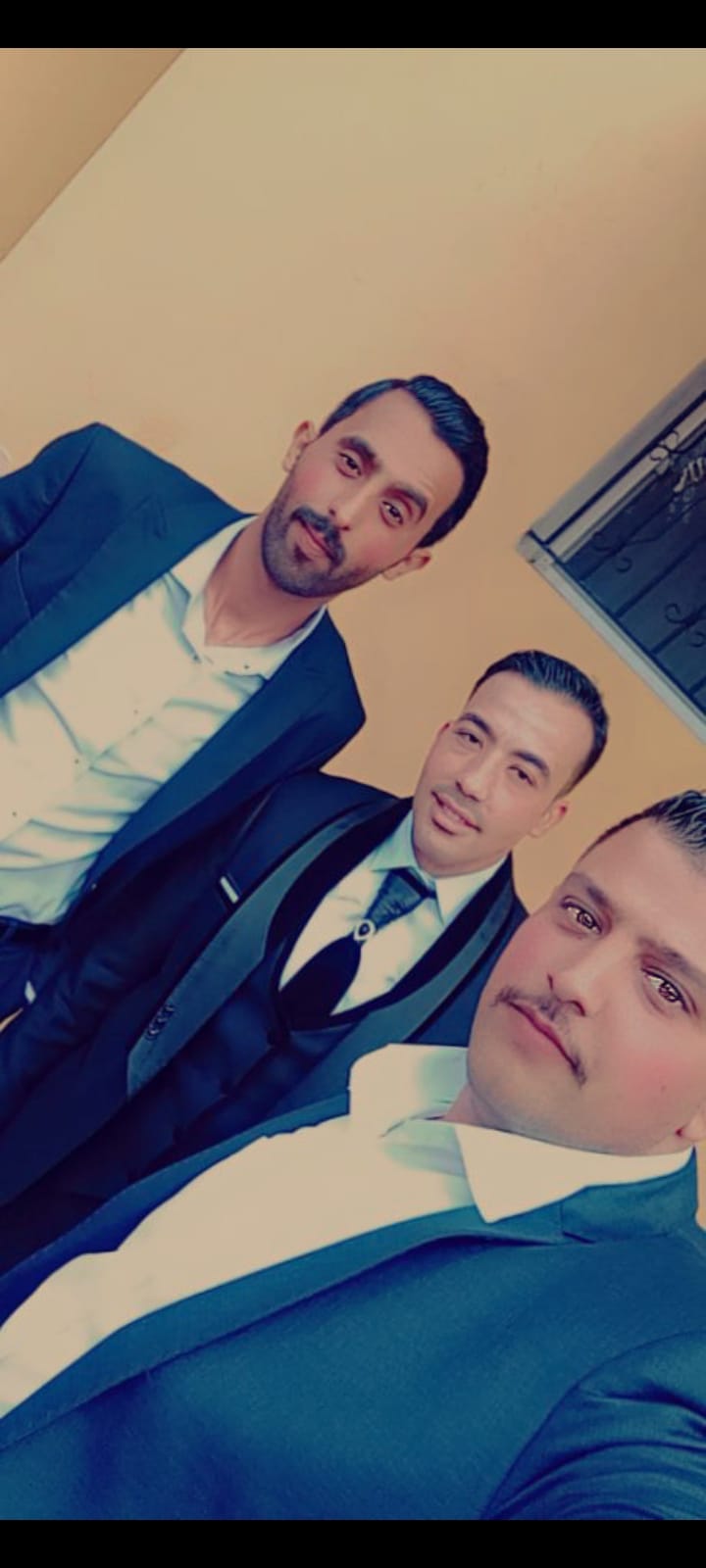 يونس العقيل يُهنئ الشقيقين باسل و محمد أبناء عبد الله الجبور  بمناسبة زواجهما